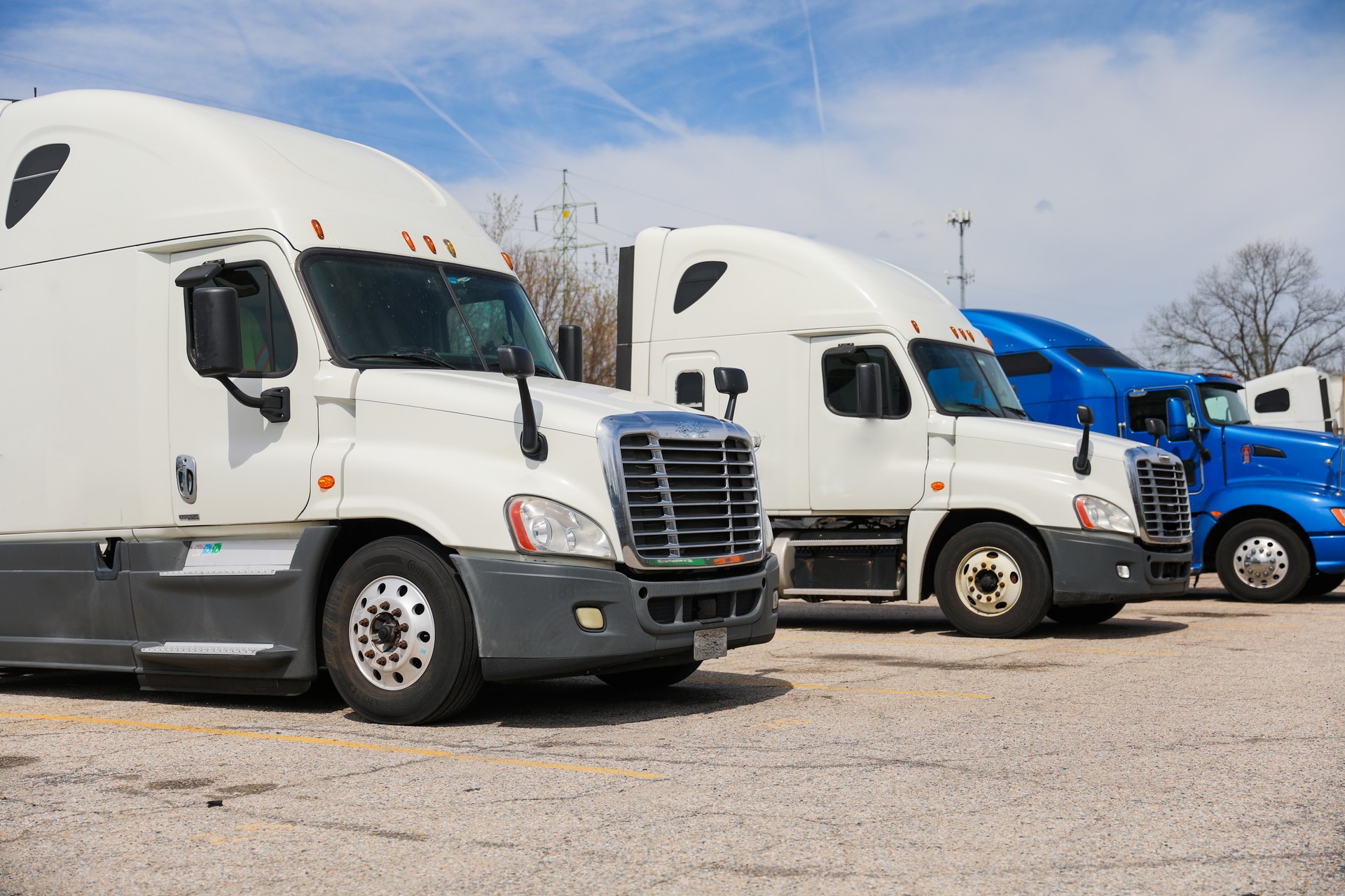 trucks and trucking as symbols of commerce, industry, and mobility. They transport goods across vast distances, fueling the economy and connecting communities.